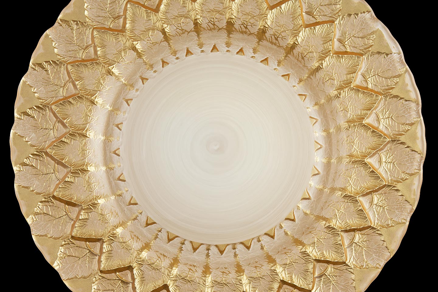 the gold creme florence charger plate from mandarin orange trading company, photographed by Jacob Rosenfeld