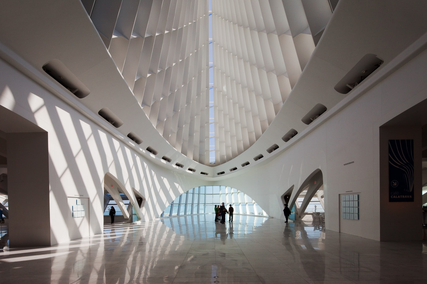 the main gallery space with vaulted glass ceiling at the Milwaukee Art Museum, designed by Santiago Calatrava, photographed by Jacob Rosenfeld
