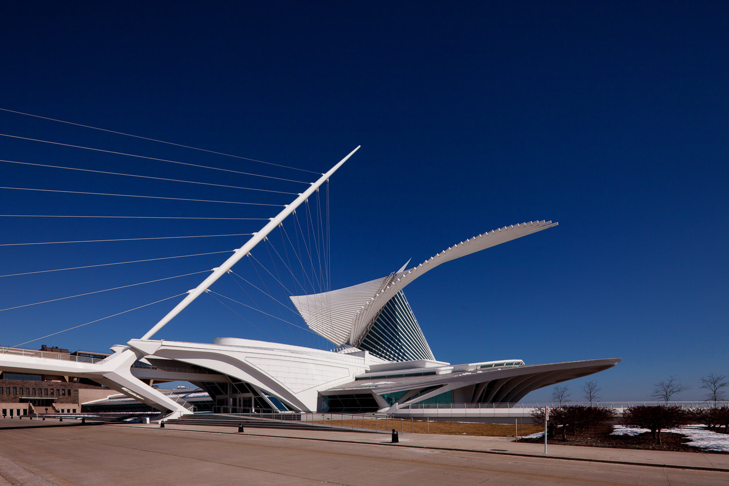 an exterior front corner close perspective of the Milwaukee Art Museum, desgined by Santiago Calatrava, photographed by Jacob Rosenfeld
