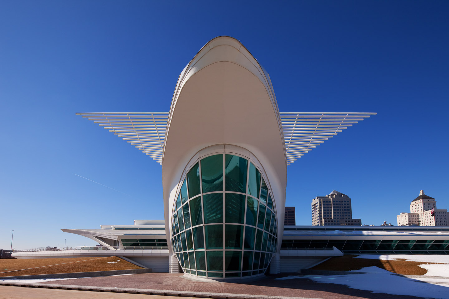 a head-on, rear exterior perspective of the Milwaukee Art Museum, designed by Santiago Calatrava, photographed by Jacob Rosenfeld