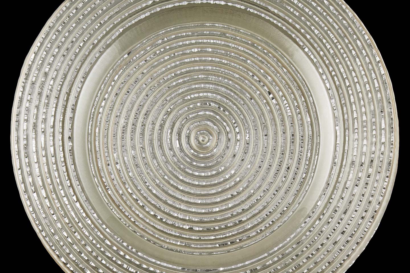 the silver pearl starlight charger plate from mandarin orange trading company, photographed by Jacob Rosenfeld