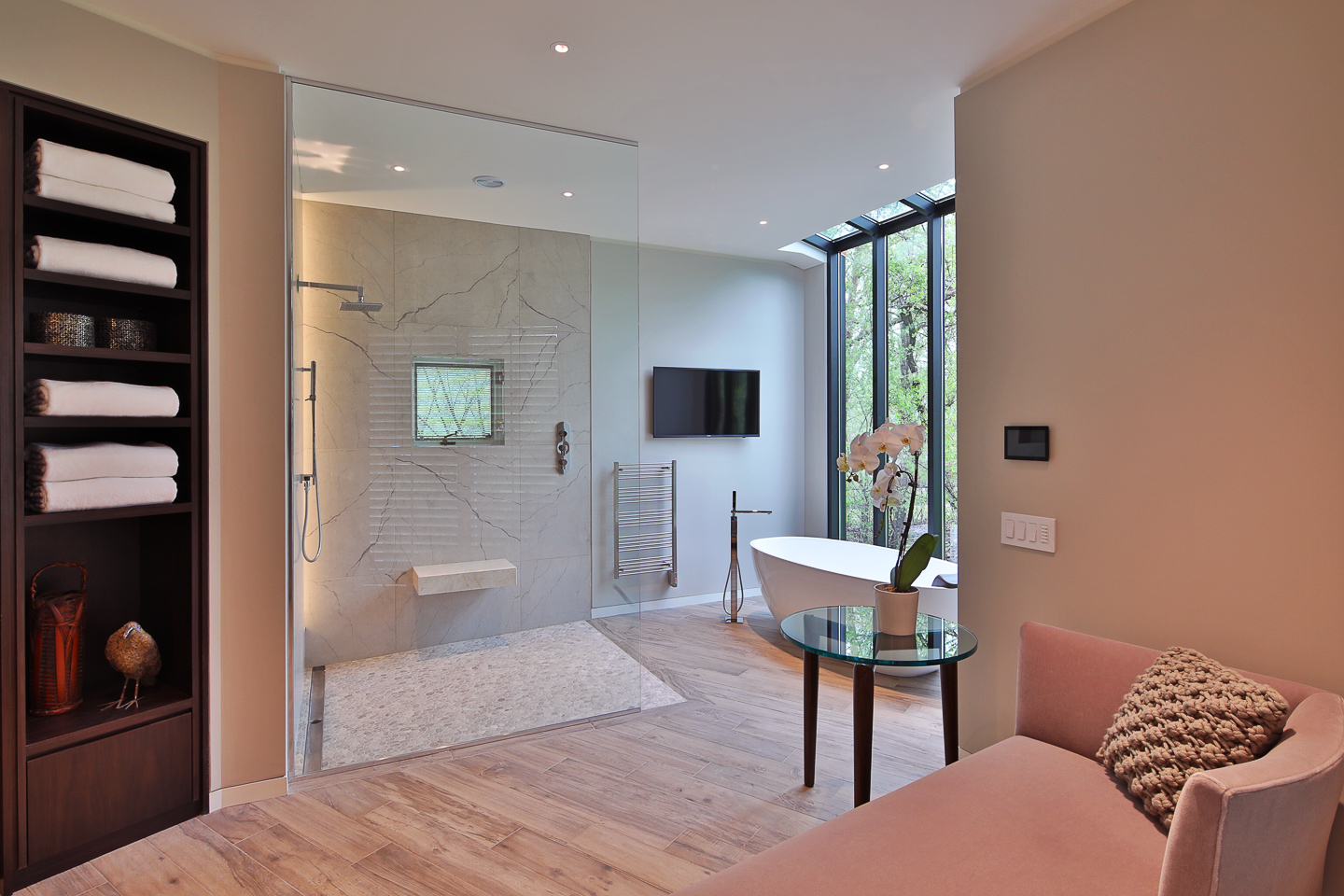 a nice sitting area at the central hub of the master bath suite, photographed by Jacob Rosenfeld